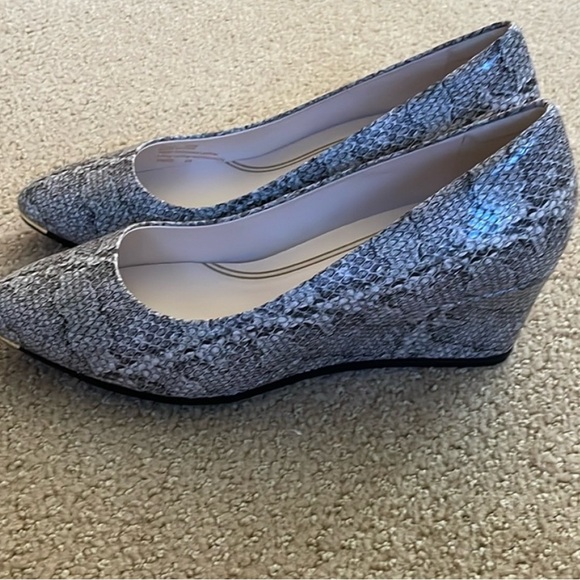 Cole Haan Shoes - Cole Haan wedge, never wore, size 8.5

Cute design, incredibly comfy